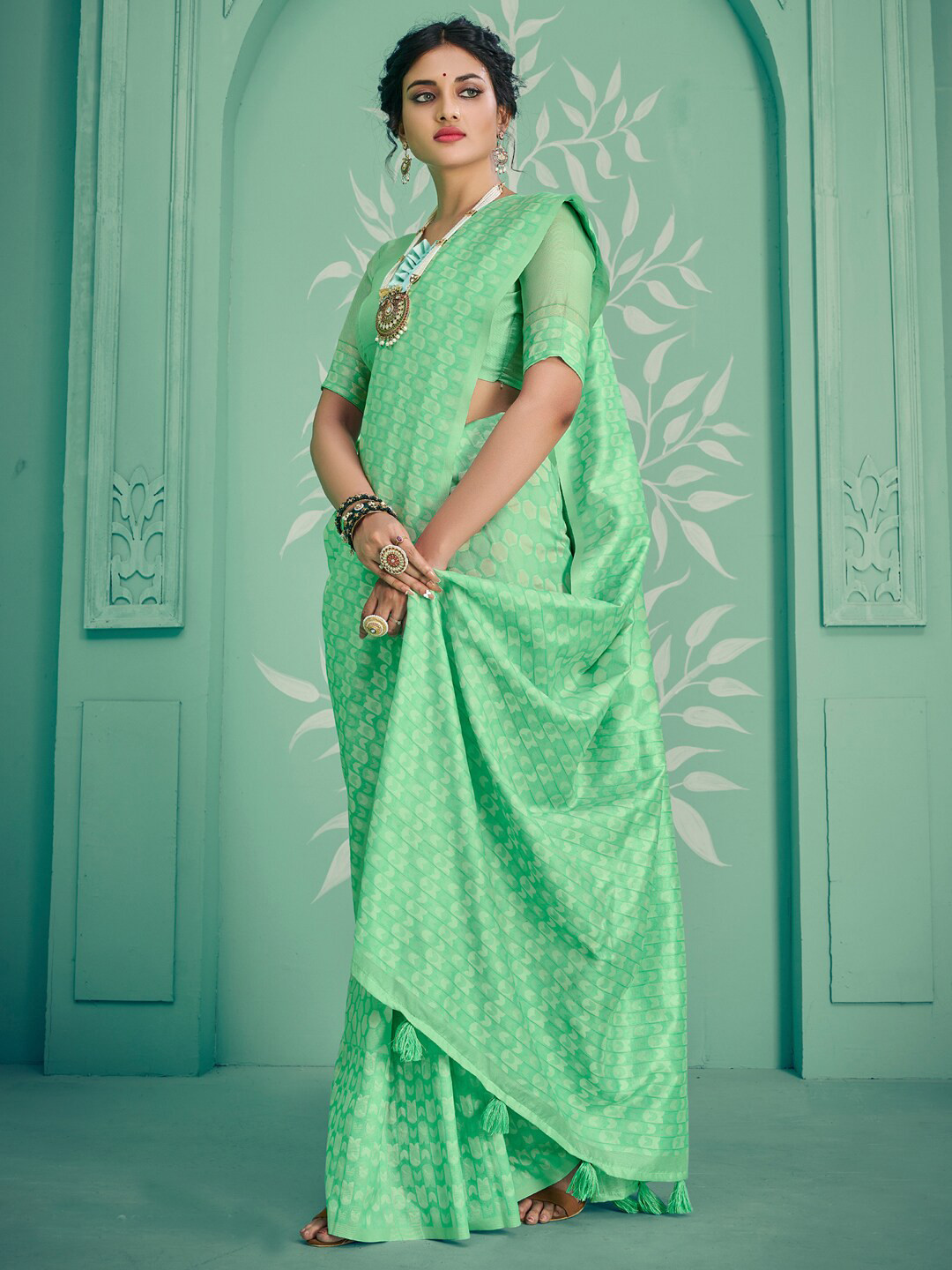 

Sangria Sea Green Geometric Woven Design Saree