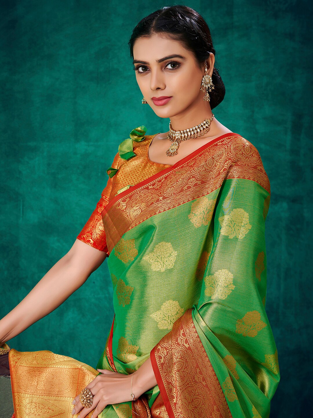 

Sangria Green & Orange Coloured Ethnic Motifs Woven Design Kanjeevaram Saree With Blouse