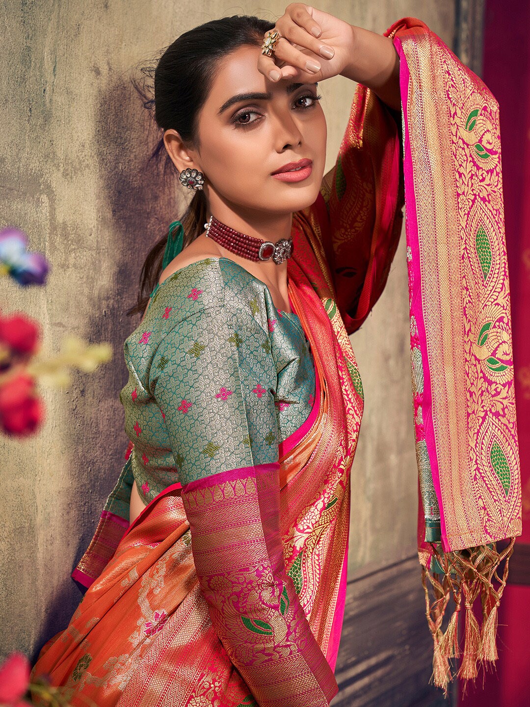 

Sangria Orange Floral Woven Design Zari Saree