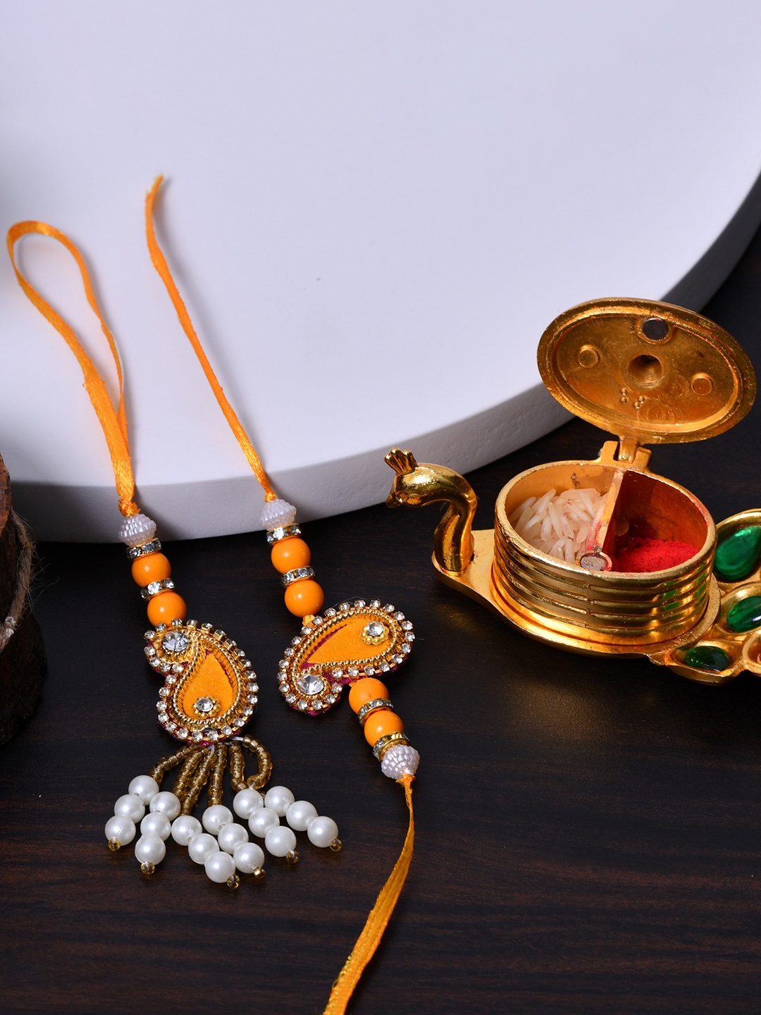 

Fashion Bizz Set of 2 Stone-Studded Rakhis Comes With Roli & Chawal, Gold