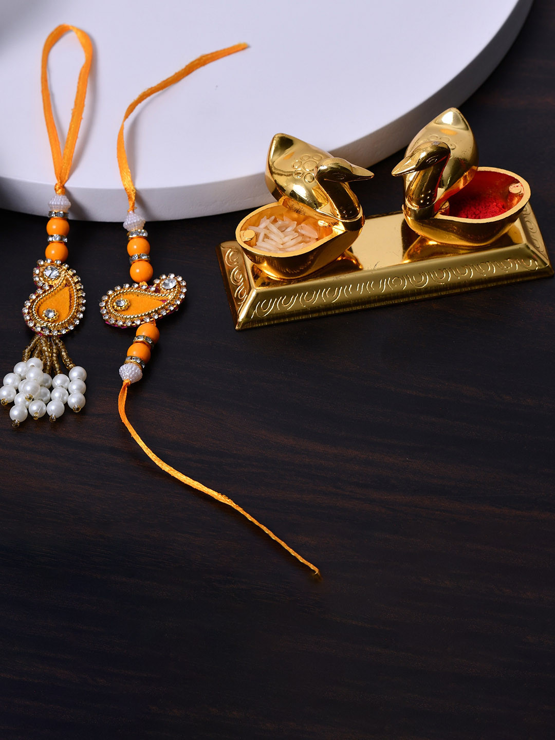 

Fashion Bizz Set of 2 Stone-Studded Rakhis Comes With Roli & Chawal, Gold