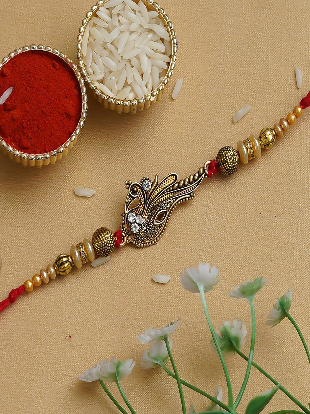 

Fashion Bizz Peacock Charm Rakhi Come With Roli & Chawal, Metallic