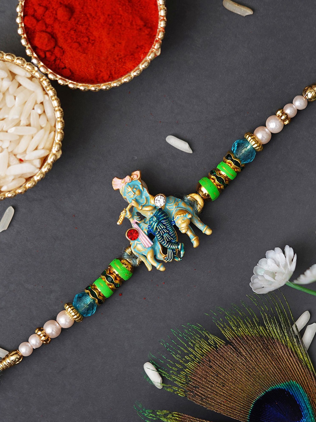 

Fashion Bizz Krishna Charm Rakhi Comes With Roli & Chawal, Green