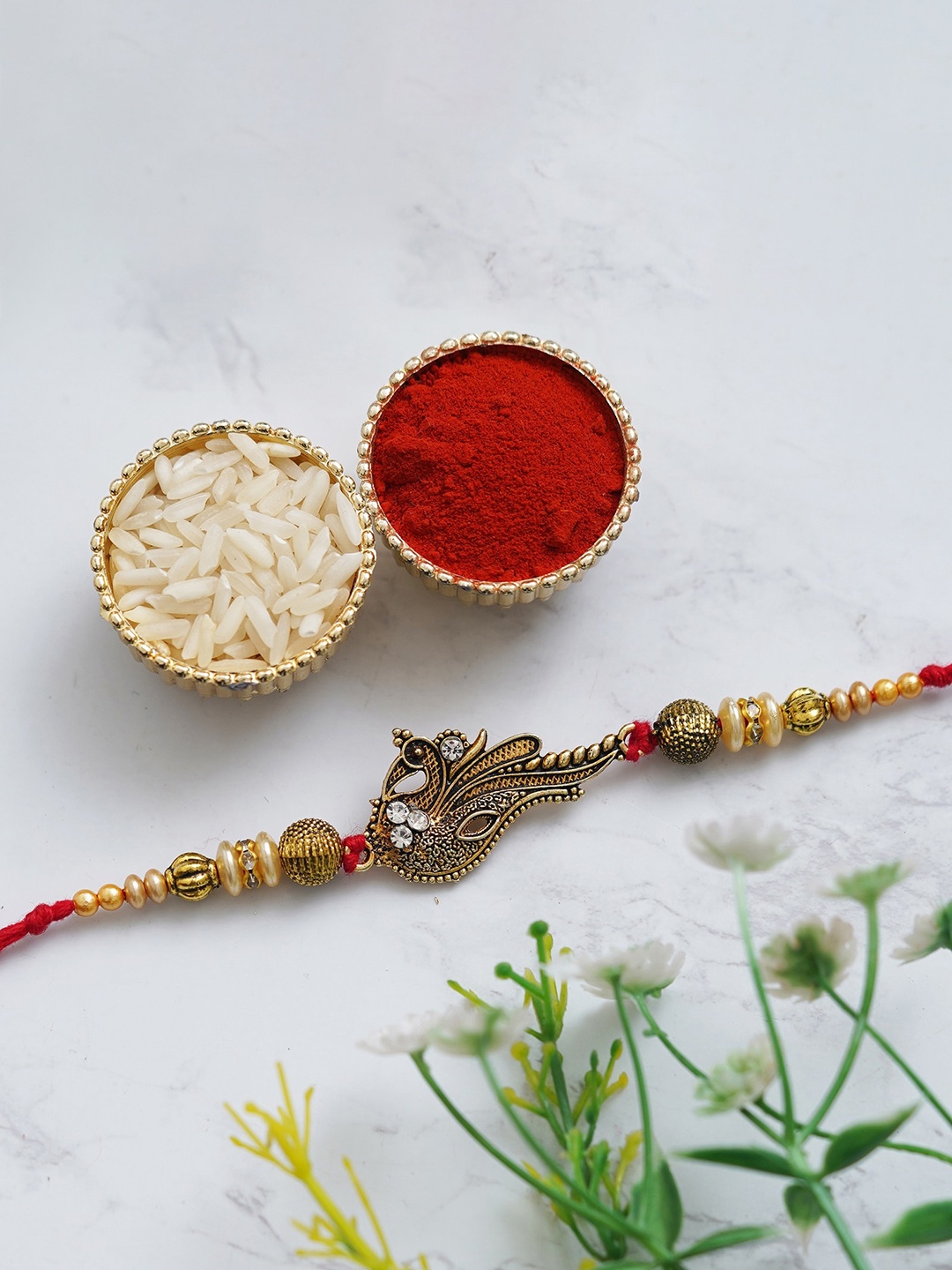 

Fashion Bizz Peacock Charm Rakhi Comes With Roli & Chawal, Gold