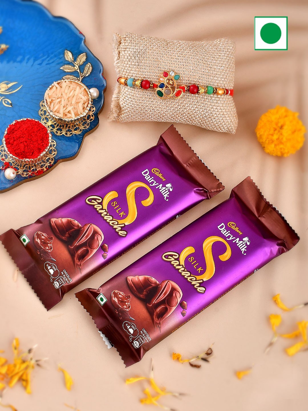 

Aapno Rajasthan Rakhi with 2 Dairy Milk Silk Ganache, Gold