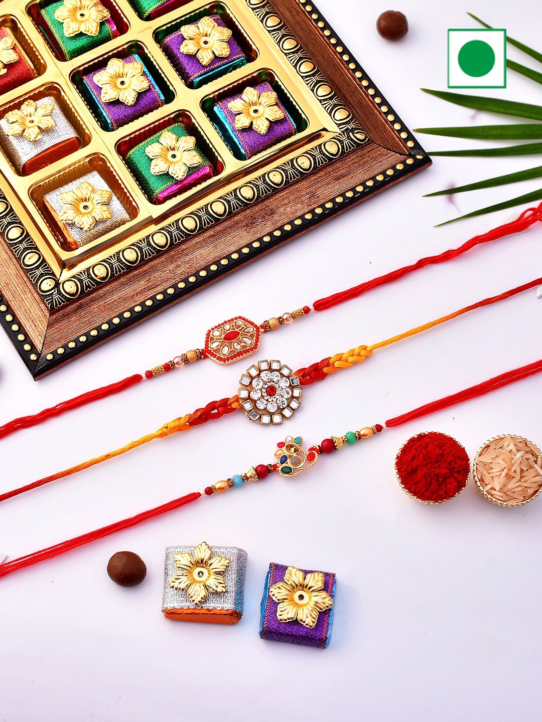 

Aapno Rajasthan Box of 9 handmade chocolates with 3 Kundan Embellished Rakhi, Gold