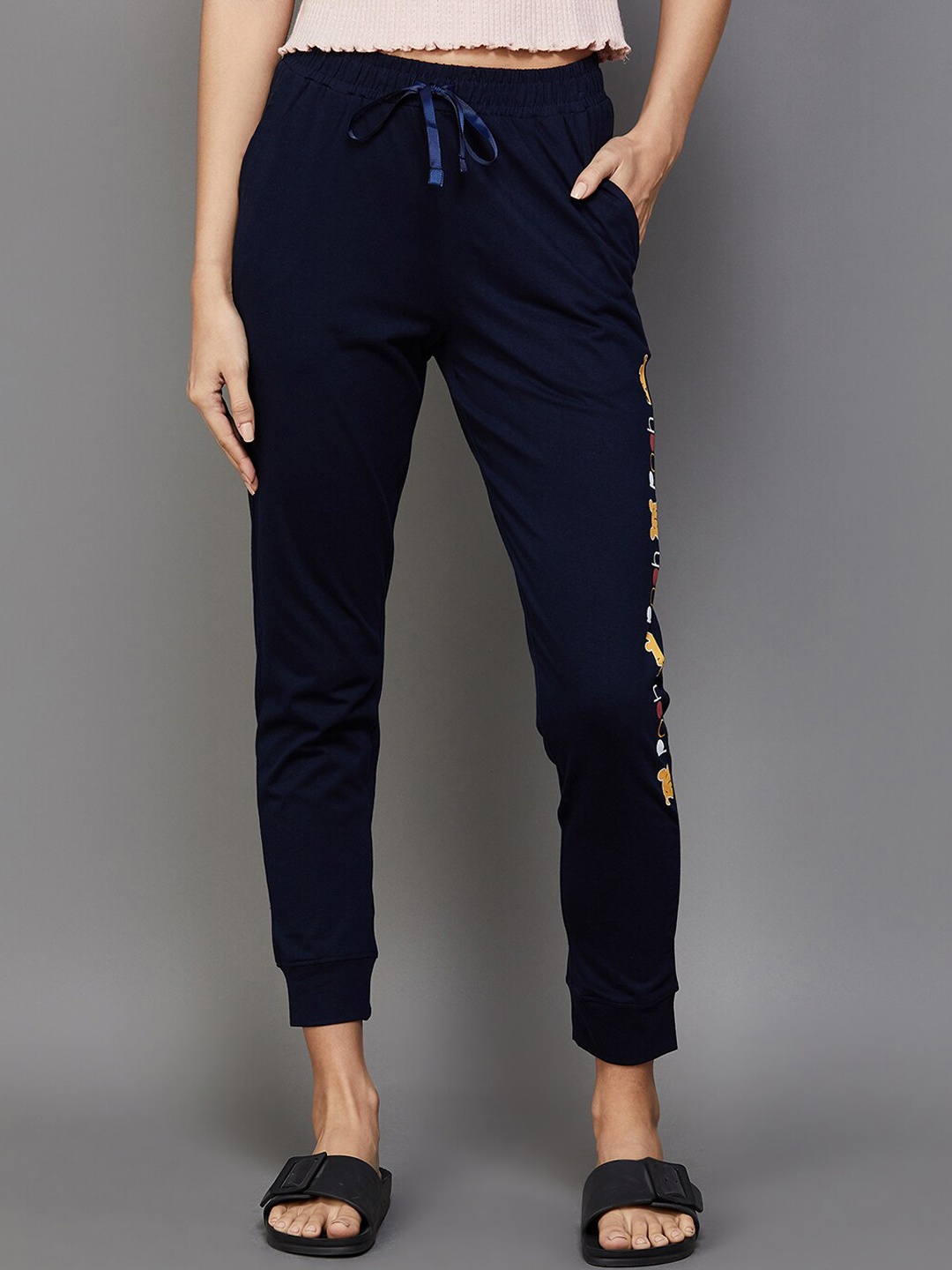 

Ginger by Lifestyle Women Winnie-the-Pooh Printed Mid-Rise Cotton Joggers, Navy blue