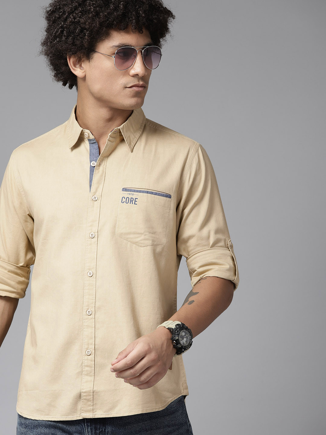 

Roadster Men Classic Opaque Roll-Up Sleeves Linen Casual Shirt, Beige