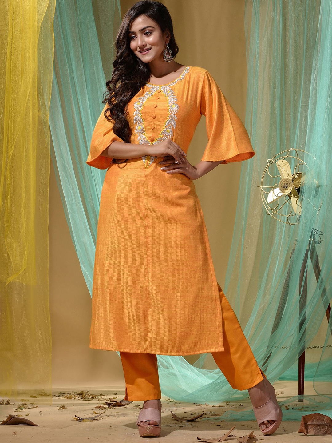 

Disli Floral Yoke Design Thread Work Kurta With Trousers, Mustard