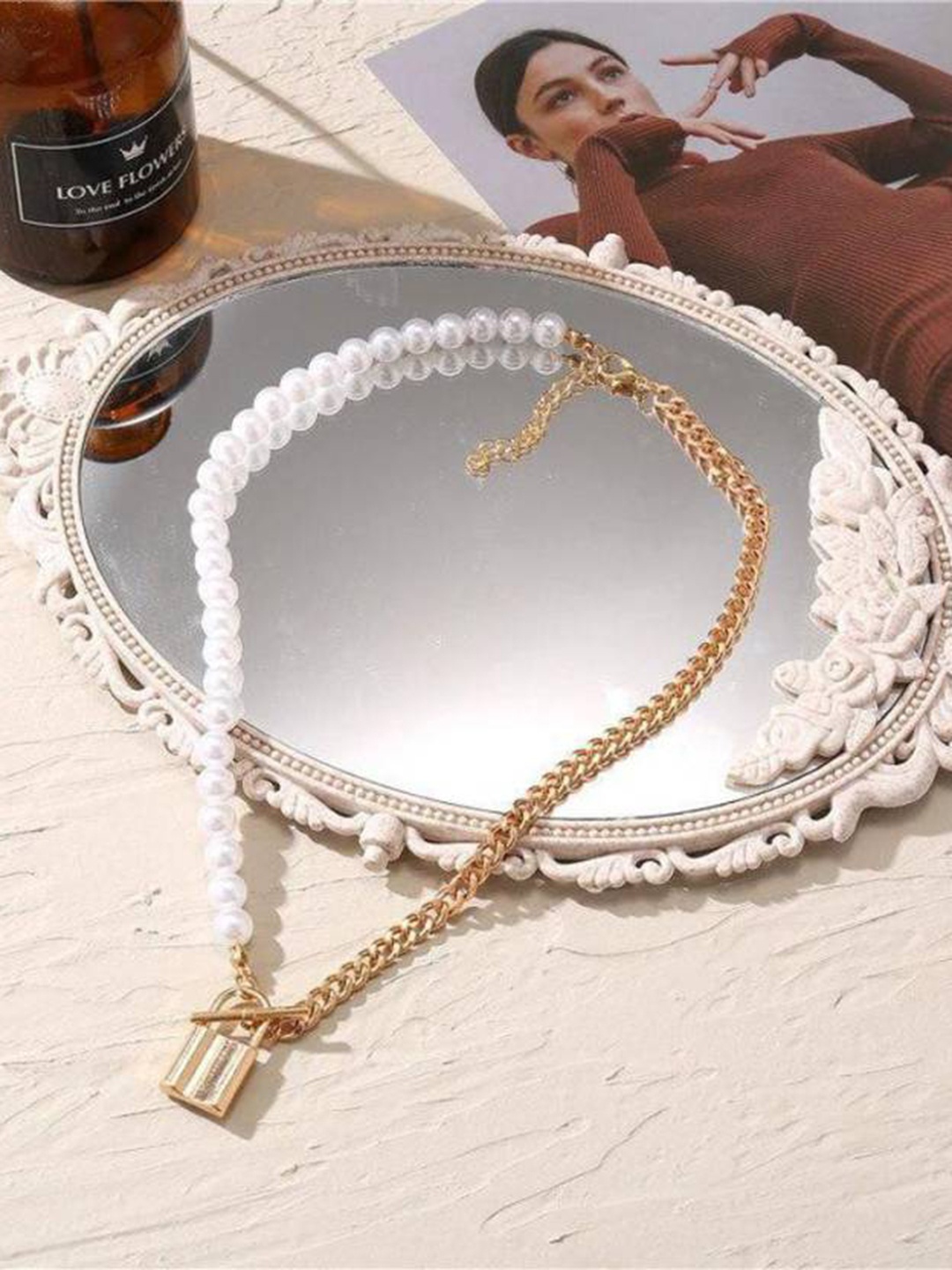

Krelin Gold-Plated Artificial Beads Half n Half Layered Padlock Pendant With Chain