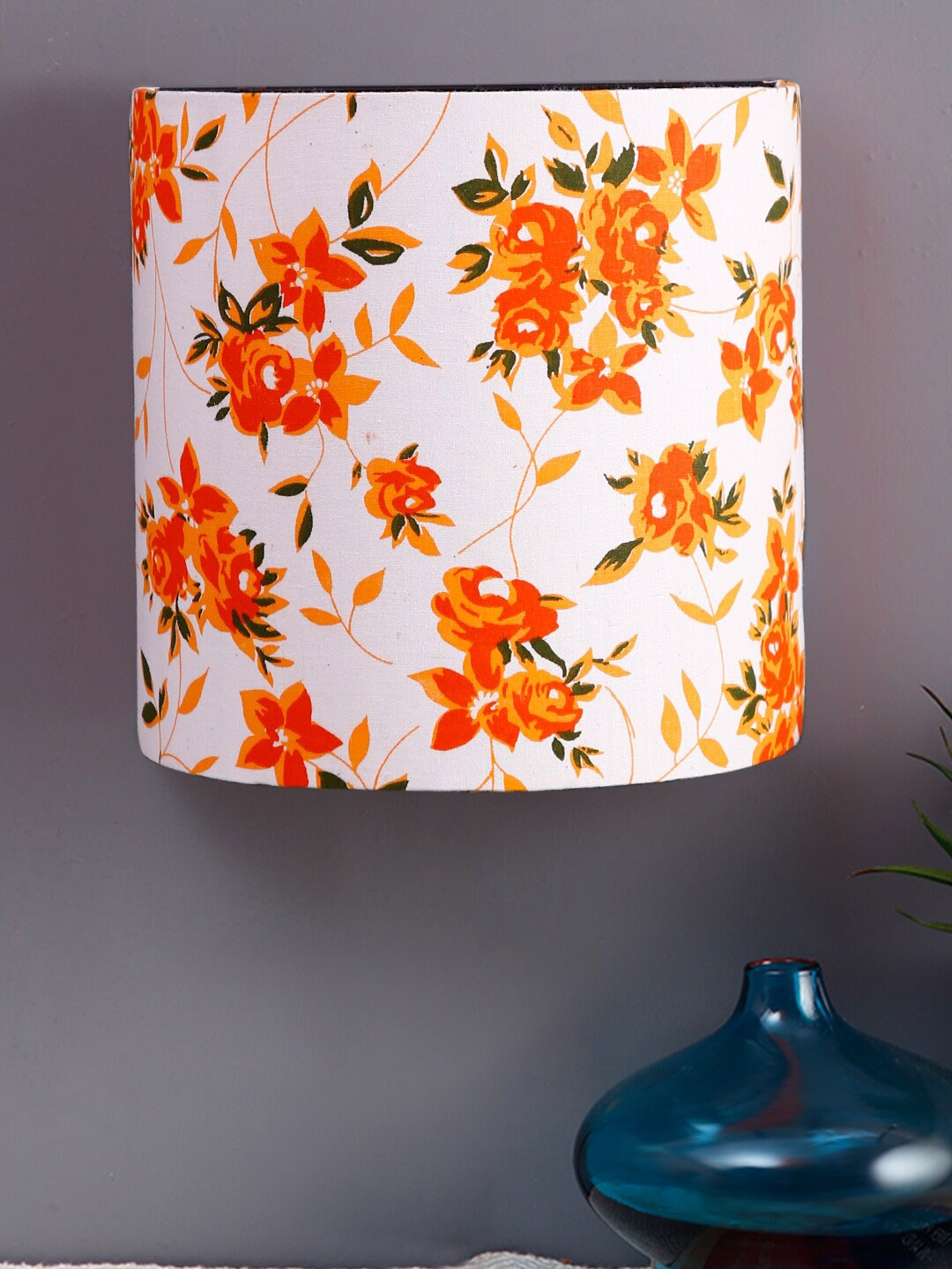 

Devansh White & Orange Printed Wall Lamp