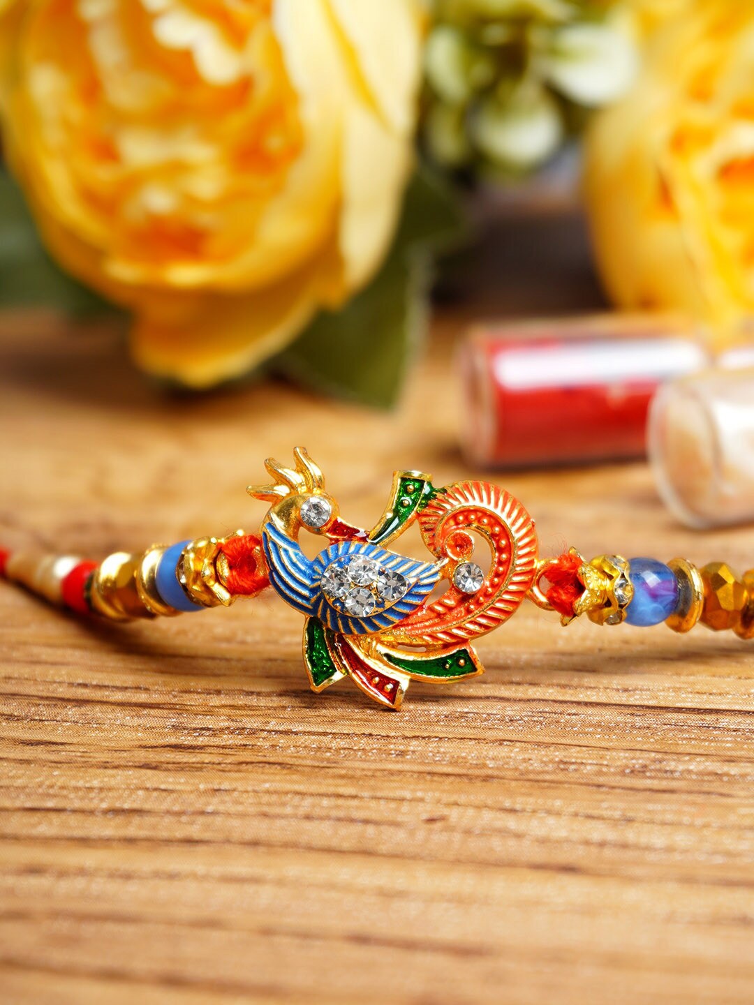 

Urmika Unisex Peacock Charm Detail Rakhi, Red