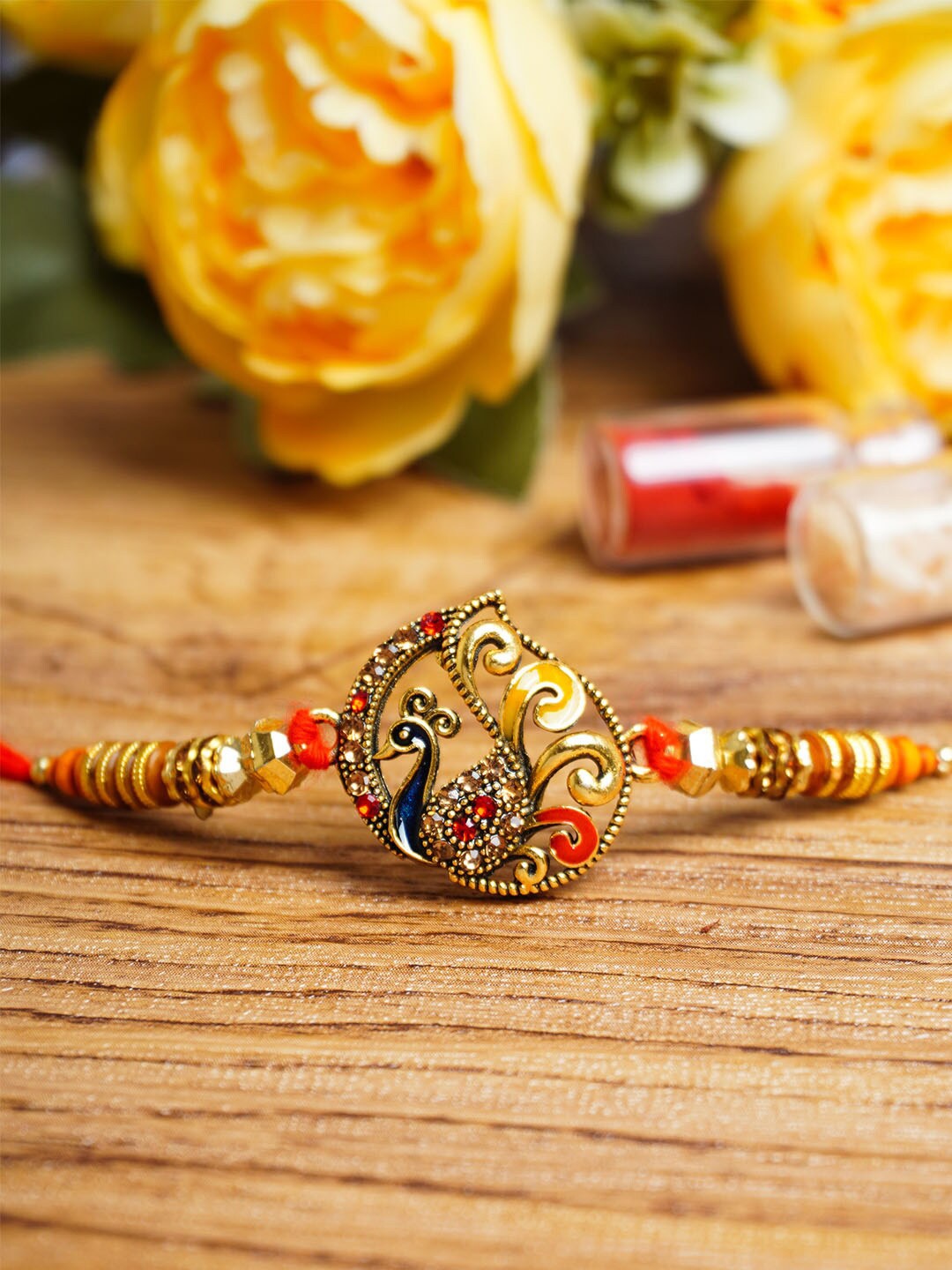 

Urmika Peacock Charm Rakhi With Roli Chawal, Red