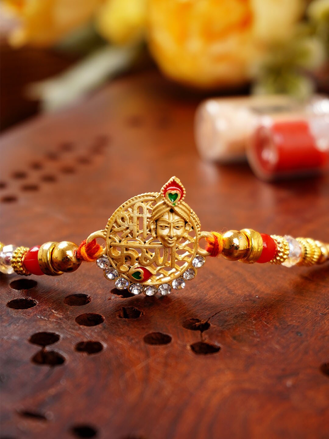 

Urmika Unisex Shri Krishna Charm Detail Rakhi, Red