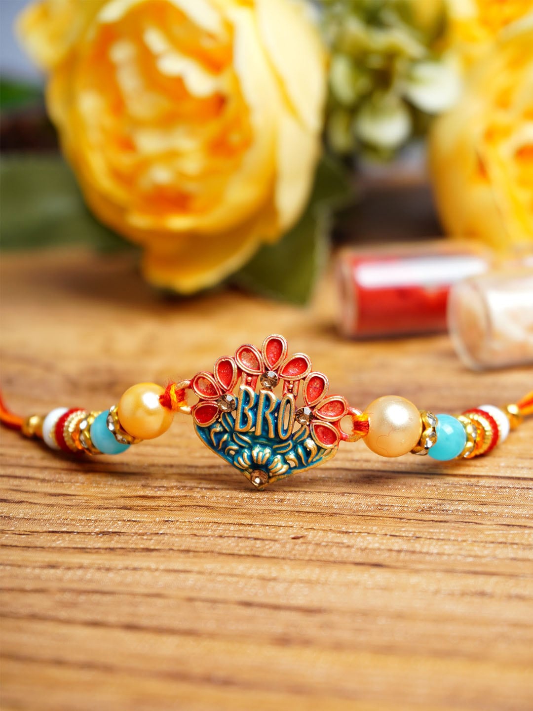 

Urmika Unisex Charm Detail Rakhi With Roli & Chawal, Red