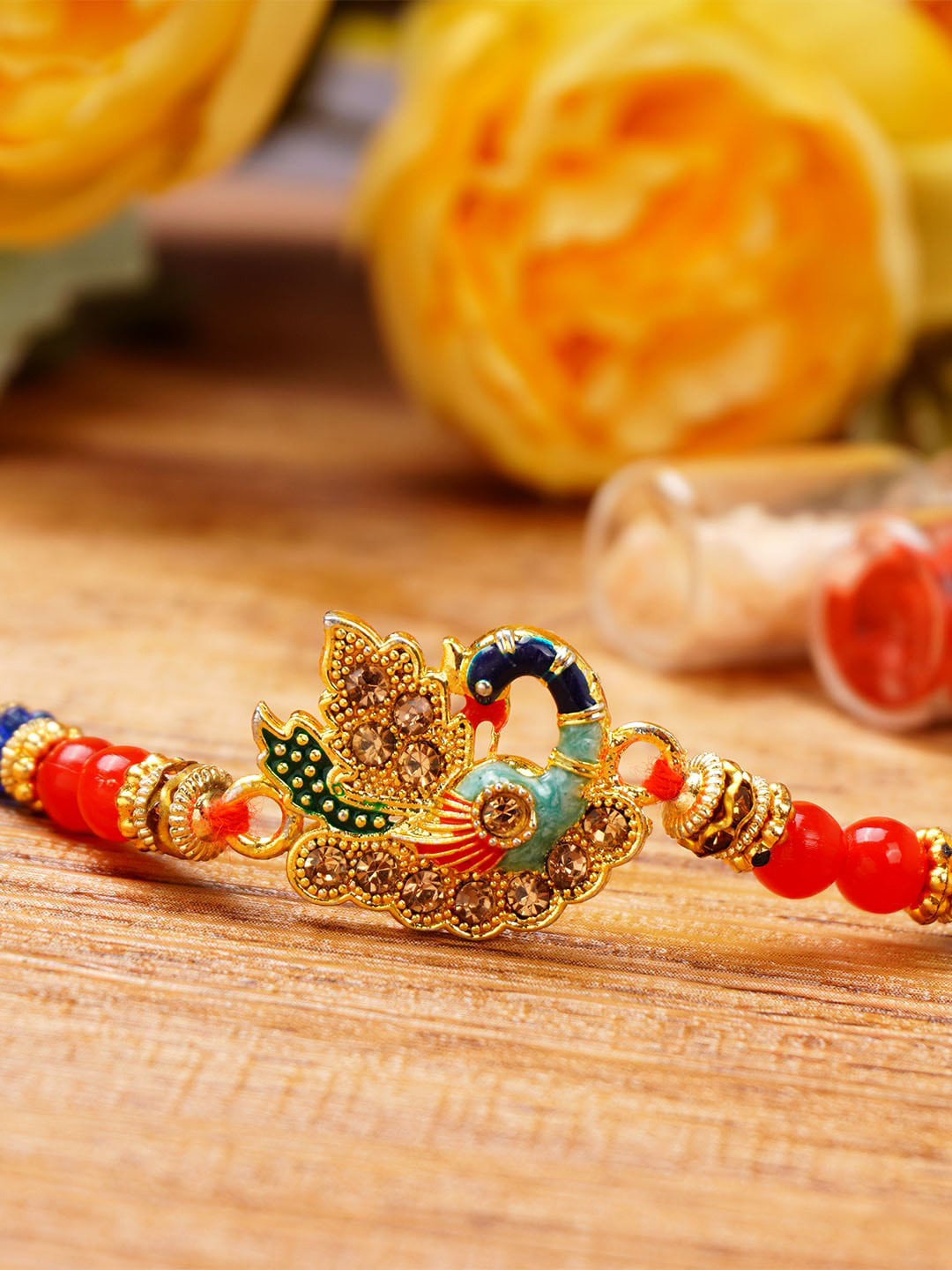 

Urmika Peacock Charm Rakhi With Roli Chawal, Gold