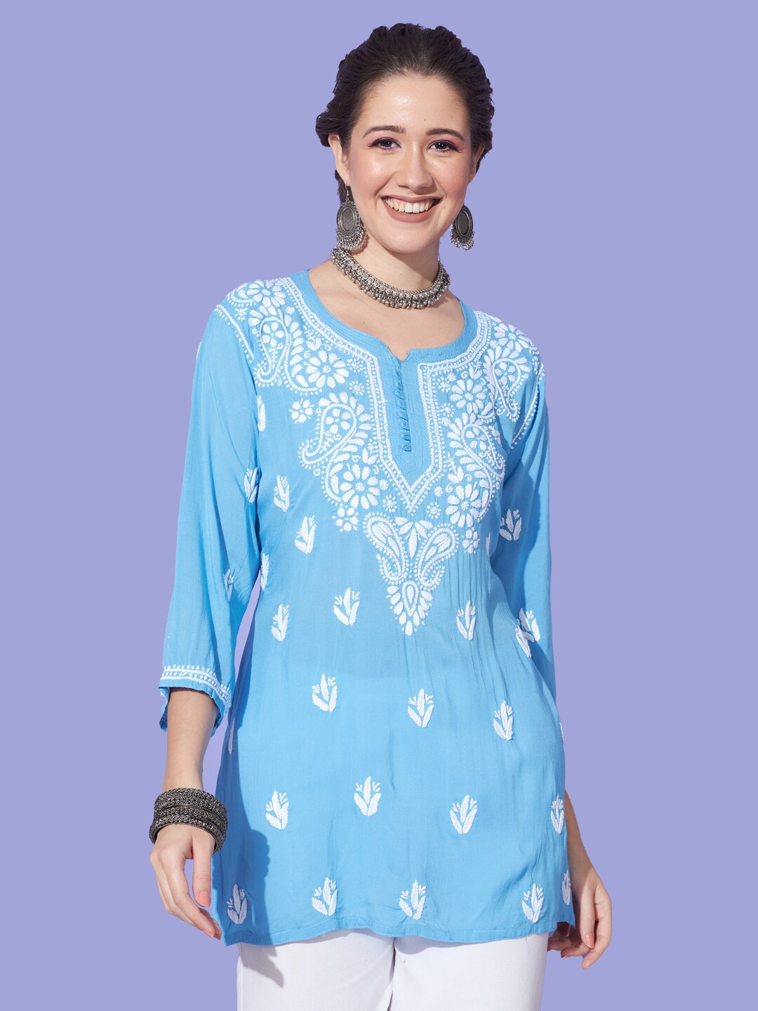 

Ethnava Floral Embroidered Round Neck Thread Work Modal Kurti, Blue