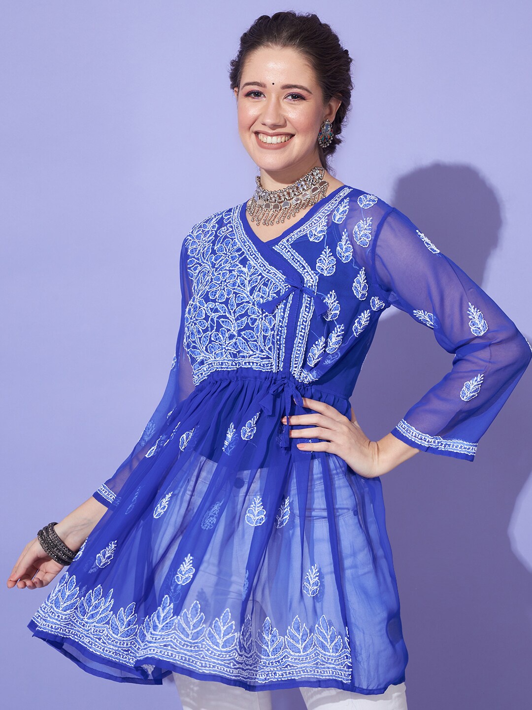 

Ethnava Floral Embroidered Thread Work Pure Georgette A Line Kurti, Blue