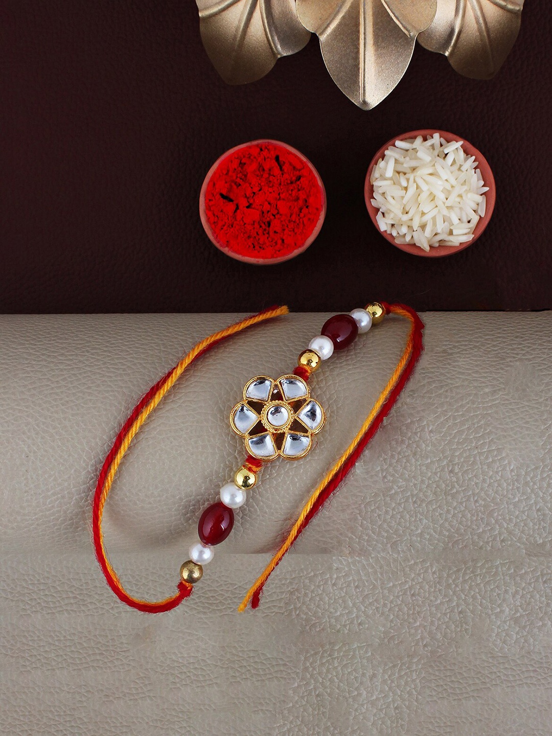 

LUCKY JEWELLERY Charm Detail Rakhi With Roli Chawal & Greeting Card, Red