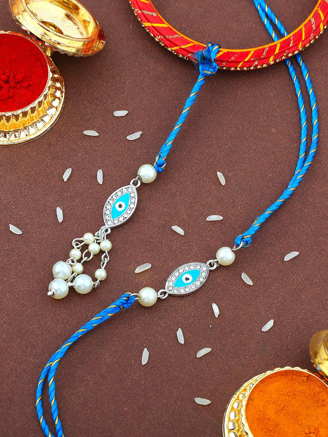 

Estele Set Of 2 Evil Eye Charm Rakhis With Roli Chawal, Blue