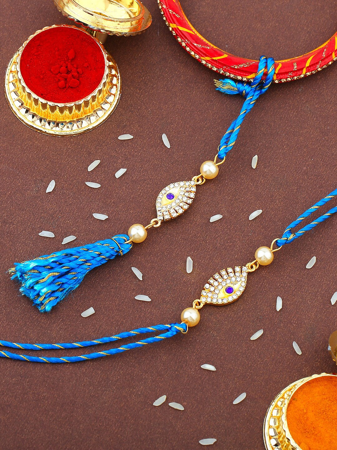 

Estele Set Of 2 Evil Eye Charm & Stone-Studded Rakhis With Roli Chawal, Blue