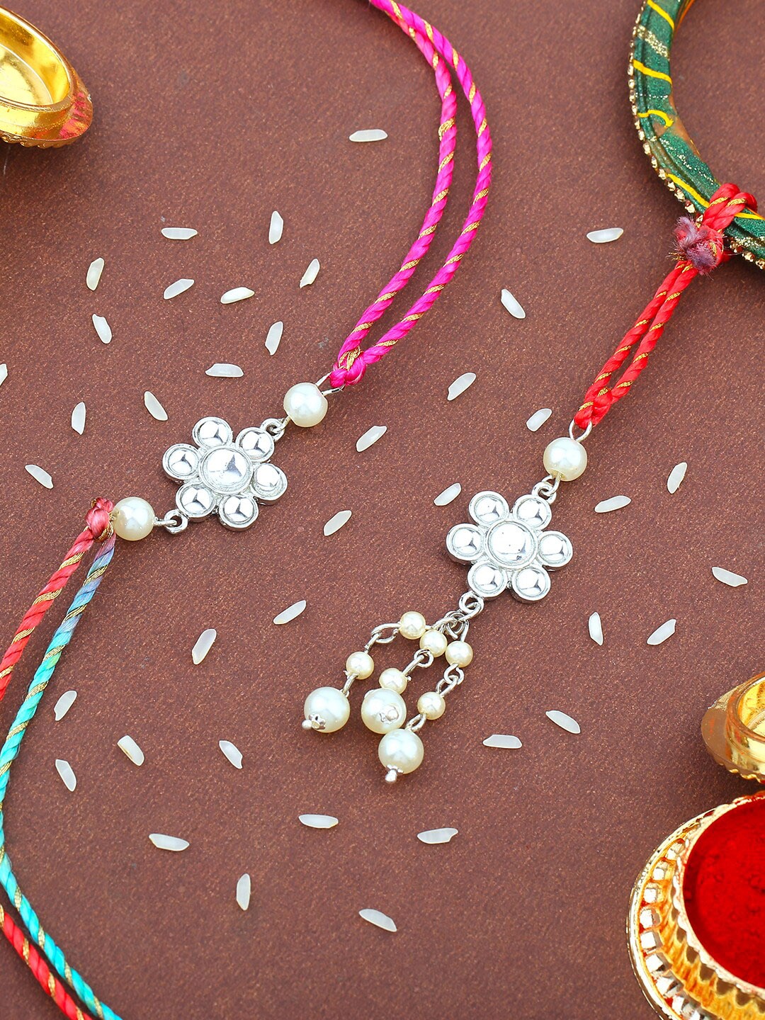 

Estele Set Of 2 Stone-Studded Floral Charm Rakhi With Roli Chawal, Silver