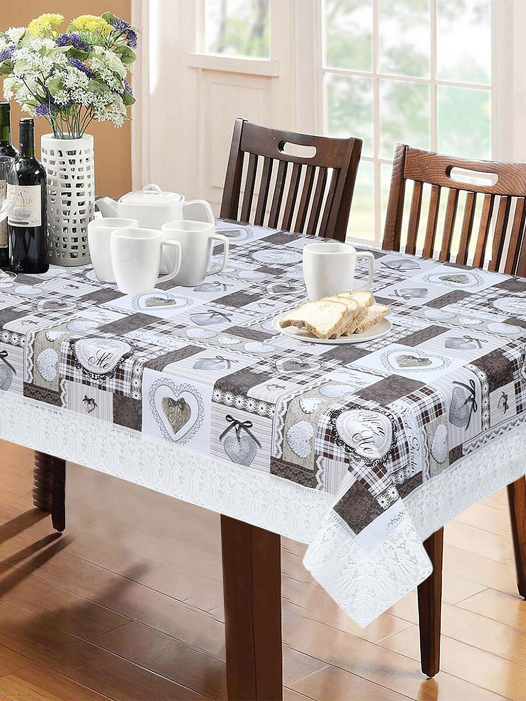 

Dakshya Industries White & Grey Printed 6-Seater Table Cover