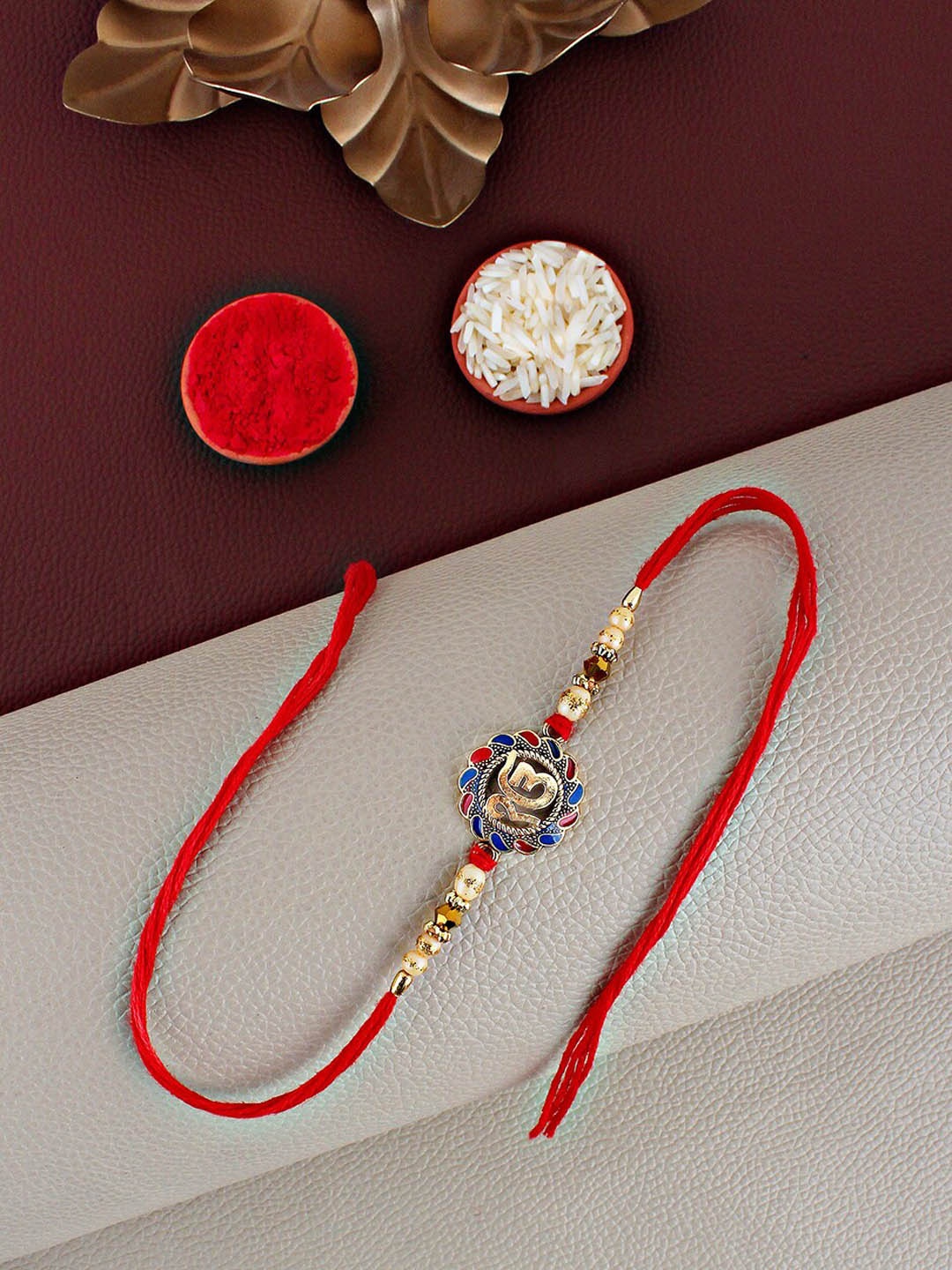 

LUCKY JEWELLERY Ek Omkar Charm Rakhi With Roli Chawal & Greeting Card, Gold