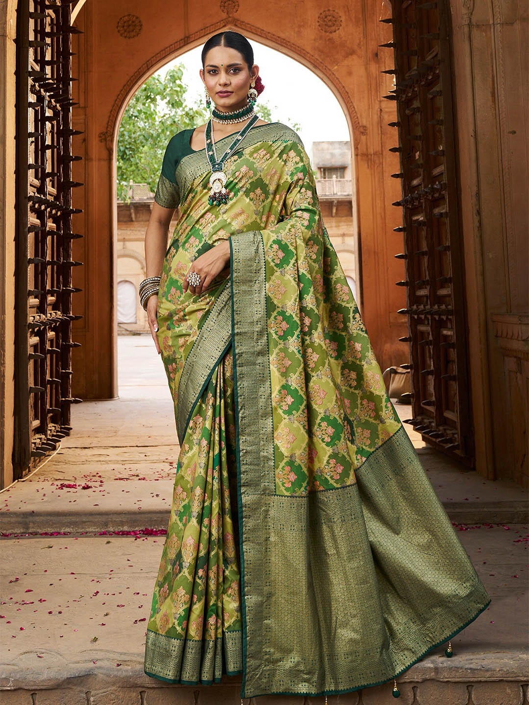 

Mitera Olive Green & Pink Ethnic Motifs Woven Design Zari Silk Cotton Ikat Saree