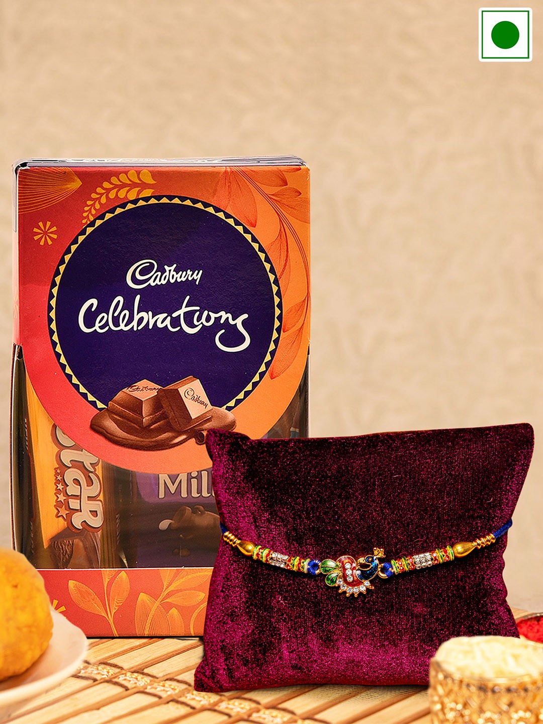 

TIED RIBBONS Peacock Rakhi with Cadbury Celebration Chocolate Pack, Blue