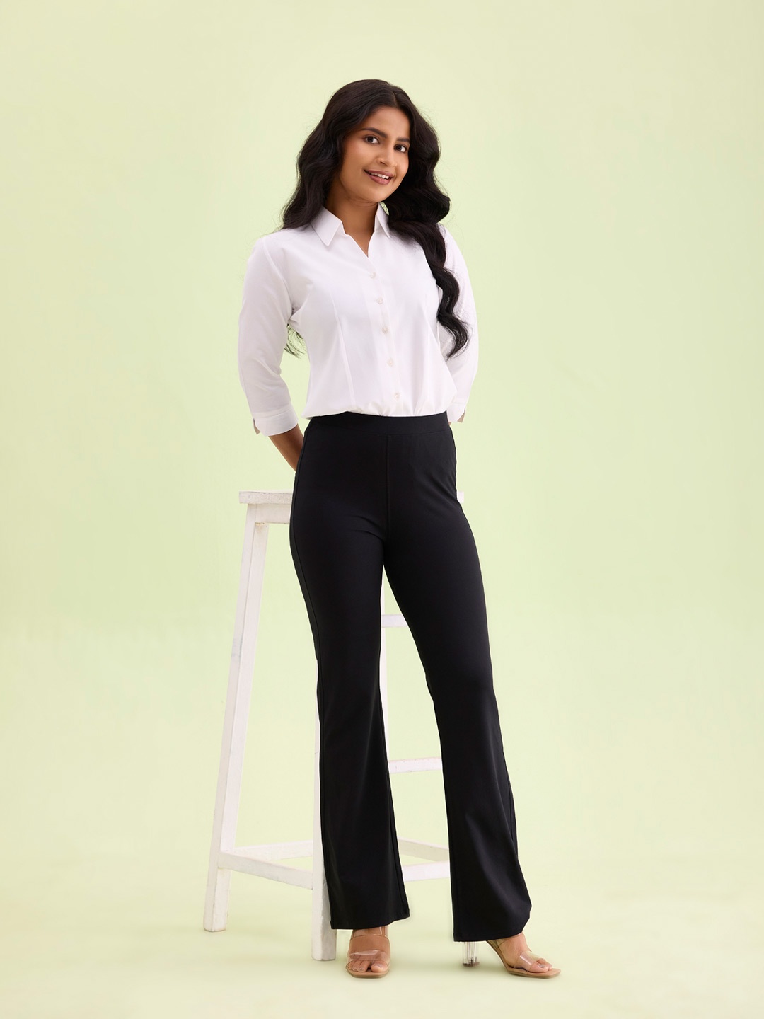 

Go Colors Women High-Rise Plain Flared Trousers, Black