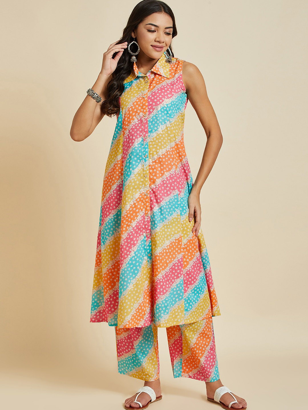 

Sangria Geometric Printed Sleeveless Pure Cotton A-line Kurta With Palazzos, Blue