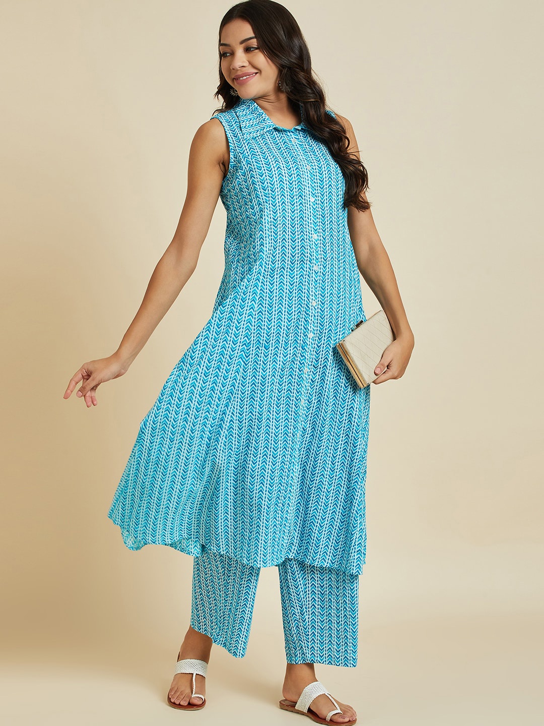 

Sangria Printed Pure Cotton A-Line Kurta With Palazzo Set, Turquoise blue