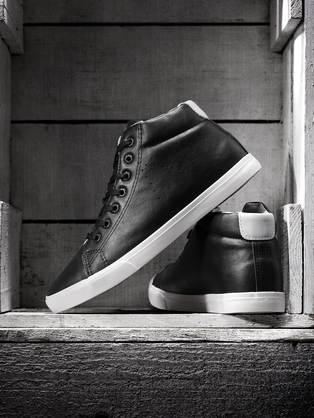 

Roadster Men Black Solid Synthetic Mid-Top Sneakers