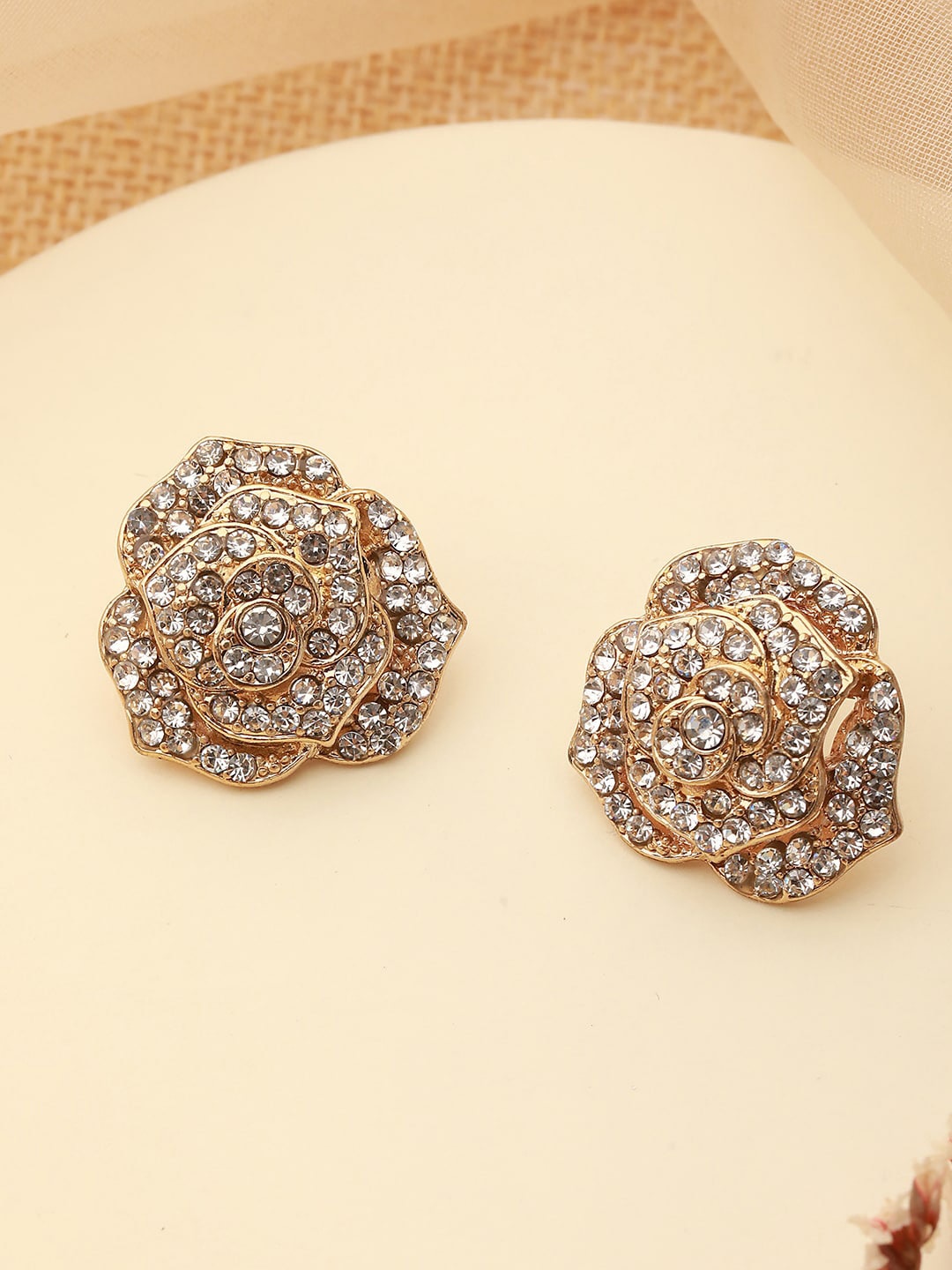 

Jazz and Sizzle Gold-Toned Floral Shaped Studs Earrings