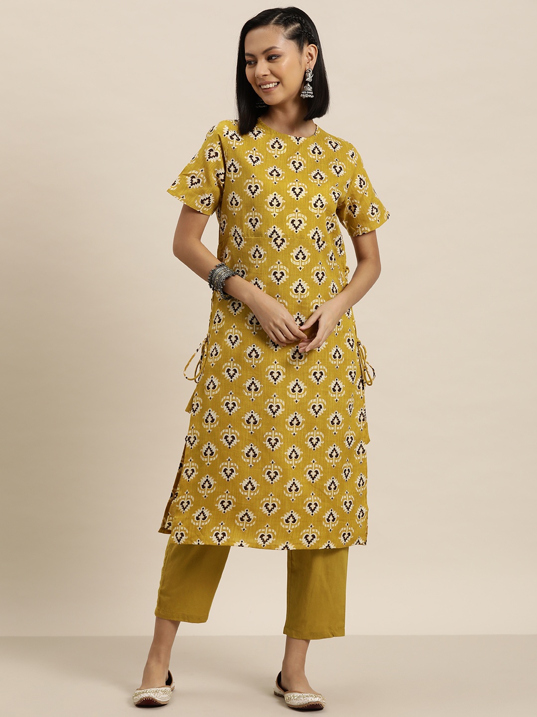 

HERE&NOW Women Mustard Yellow Floral Printed Regular Pure Cotton Kurta with Trousers