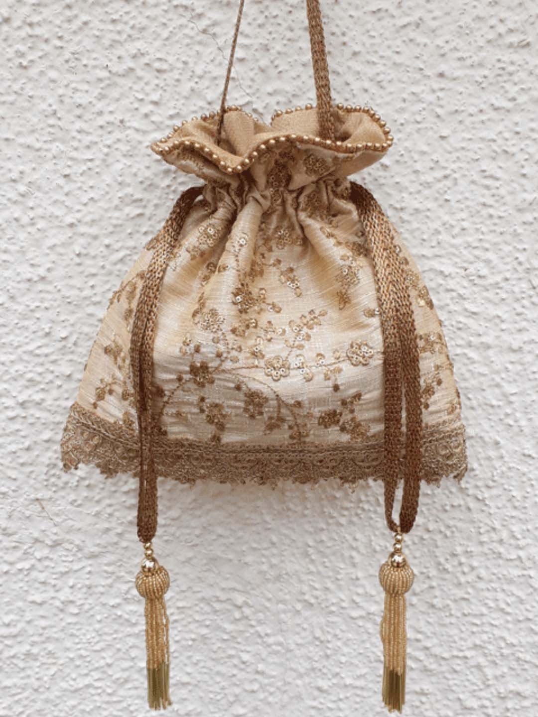 

AMYRA Embroidered Embellished Potli, Beige