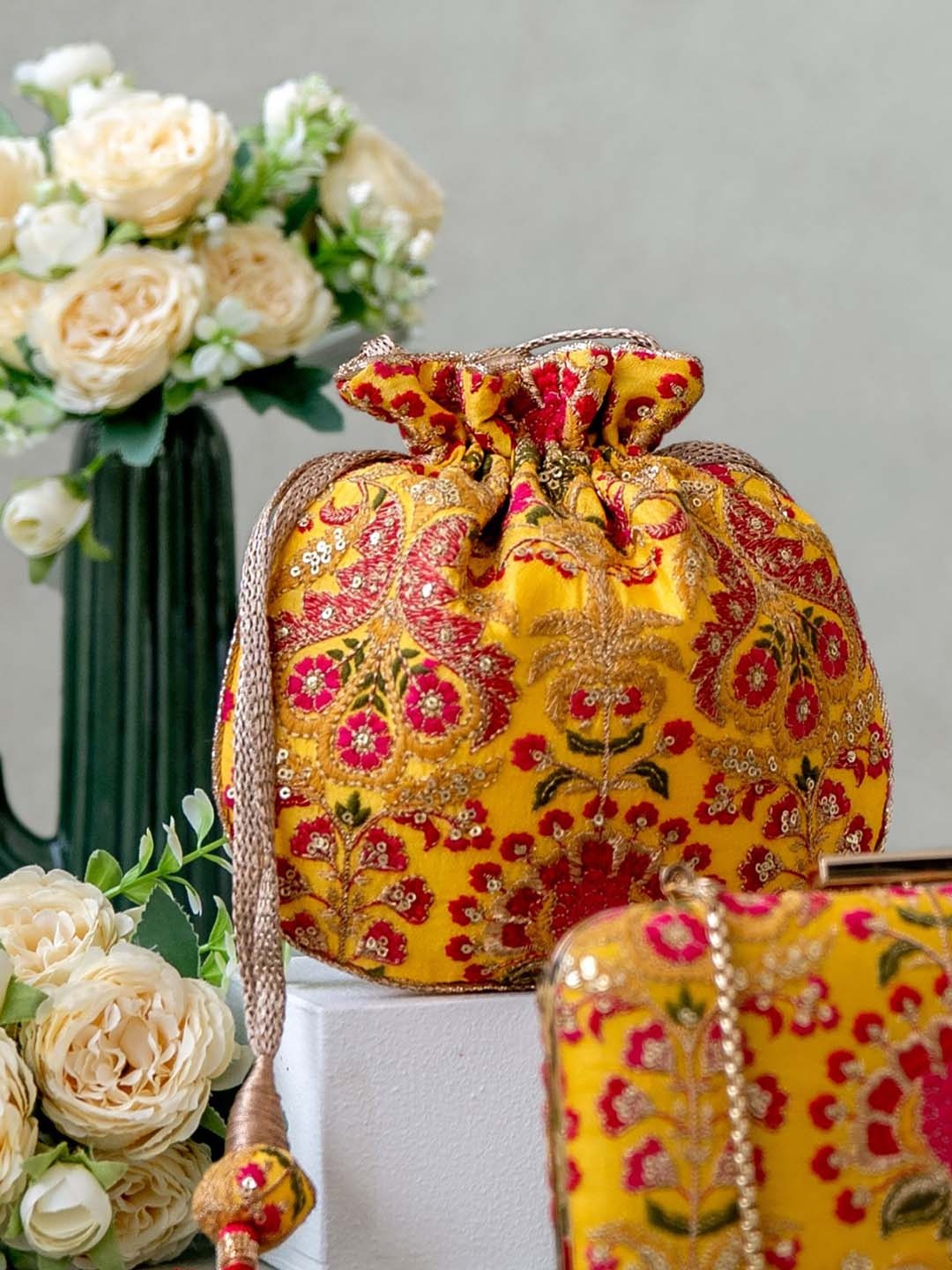 

AMYRA Embroidered Embellished Potli, Mustard