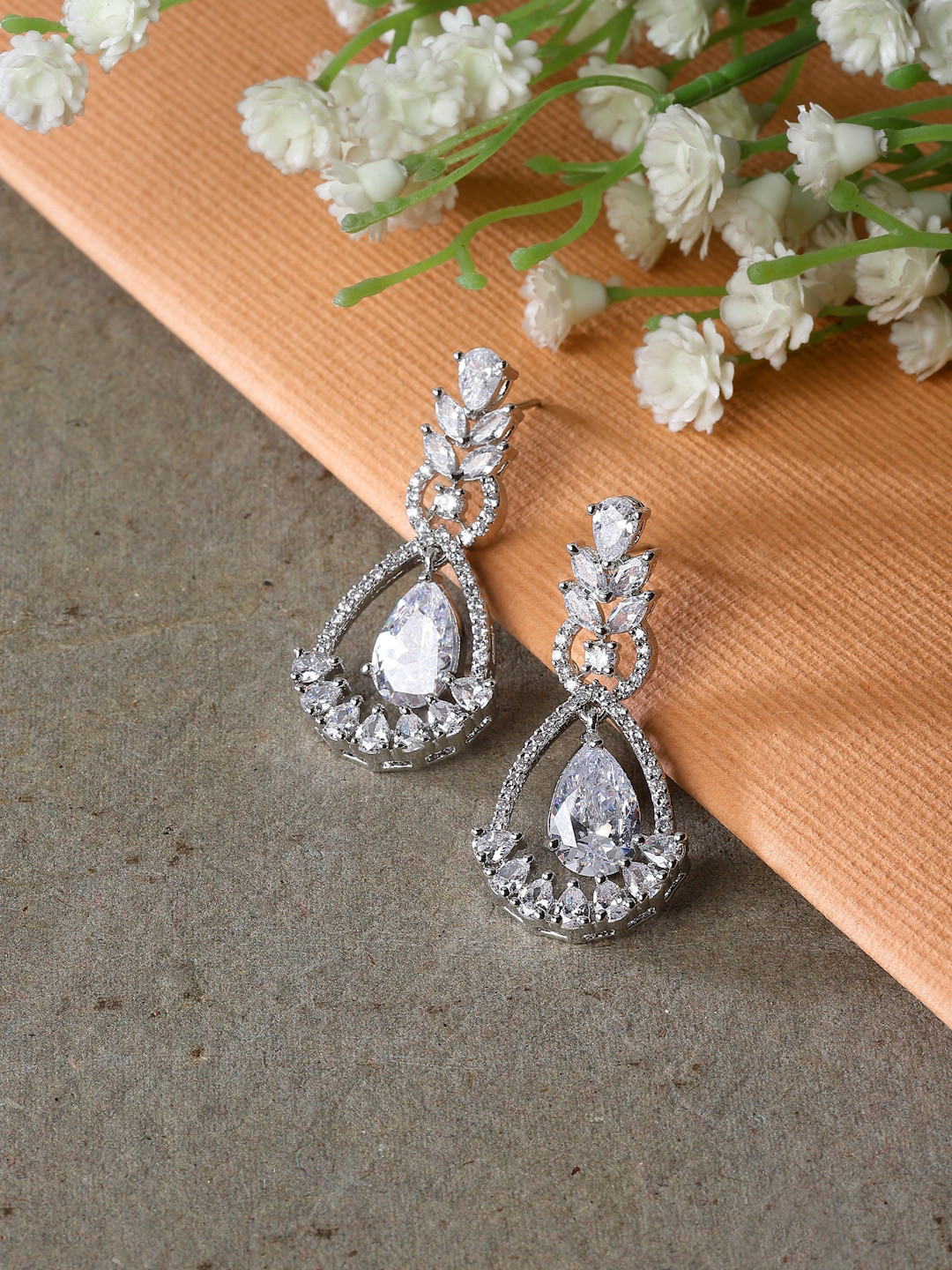 

ZENEME Rhodium-Plated American Diamond studded Teardrop & Leaf Shaped Drop Earrings, Silver