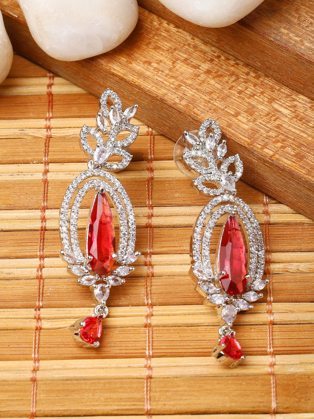 

ZENEME Rhodium Plated Oval Shaped American Diamond Studded Drop Earrings, Red