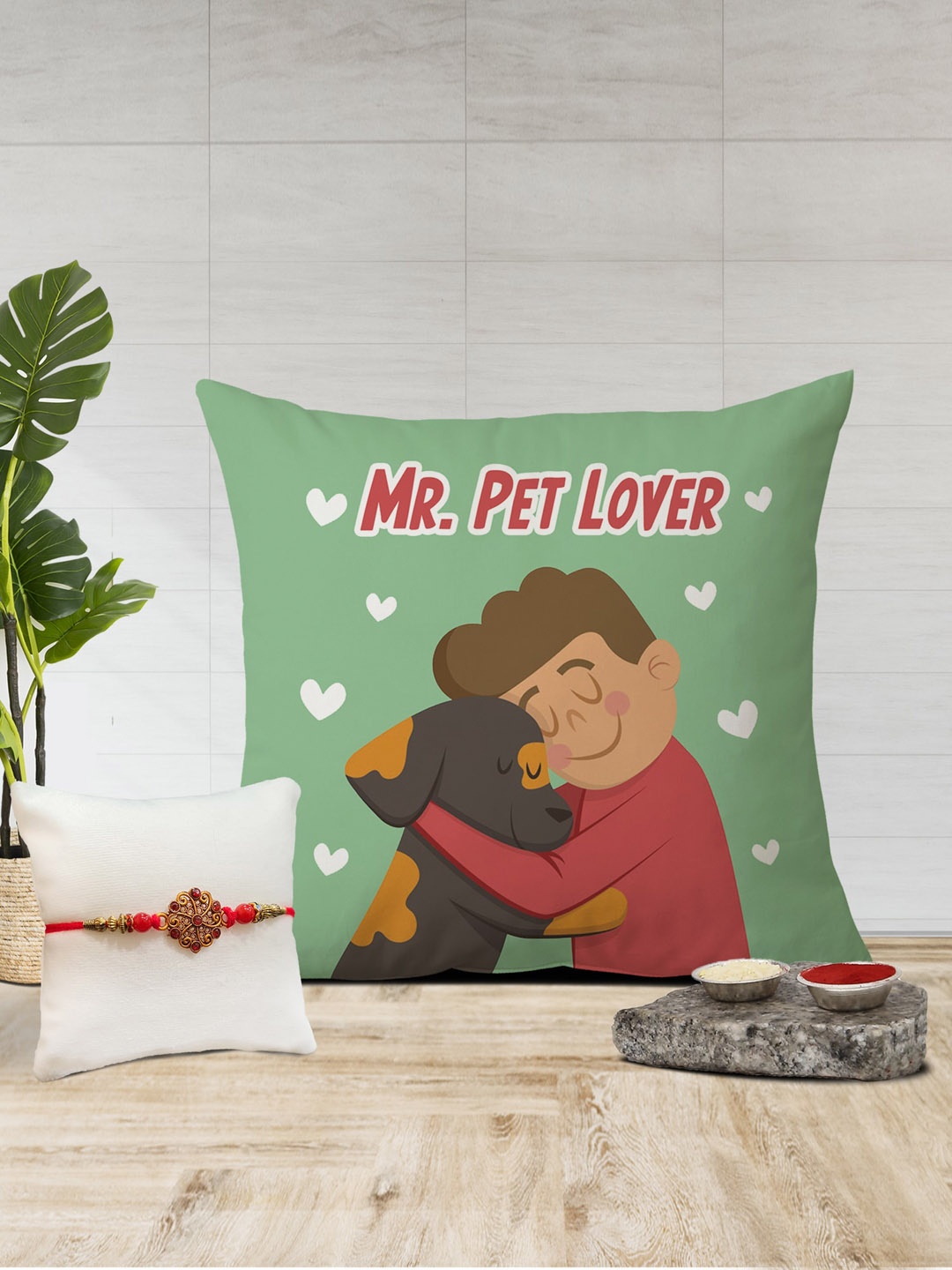 

The Purple Tree Red Rakhi With Printed Cushion & Roli Chawal