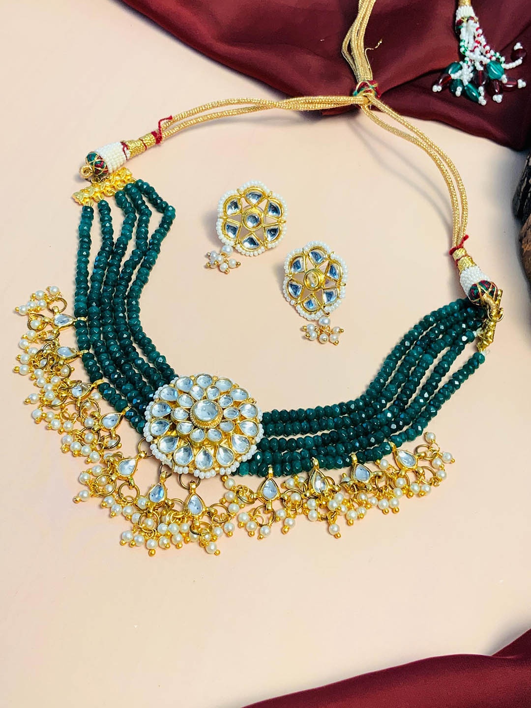 

ABDESIGNS Gold Plated Kundan Studded & Beaded Jewellery Set