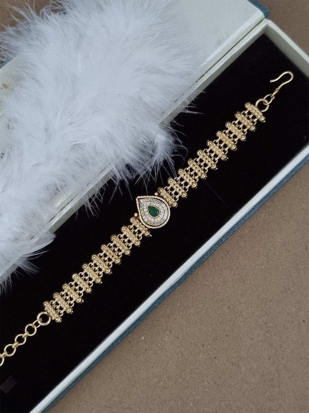 

Anouk Brass Kundan Gold-Plated Charm Bracelet