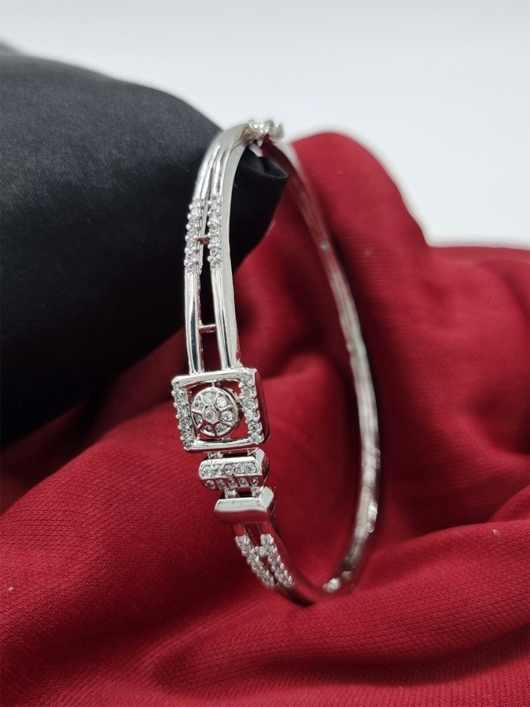 

Anouk Brass American Diamond Silver-Plated Kada Bracelet