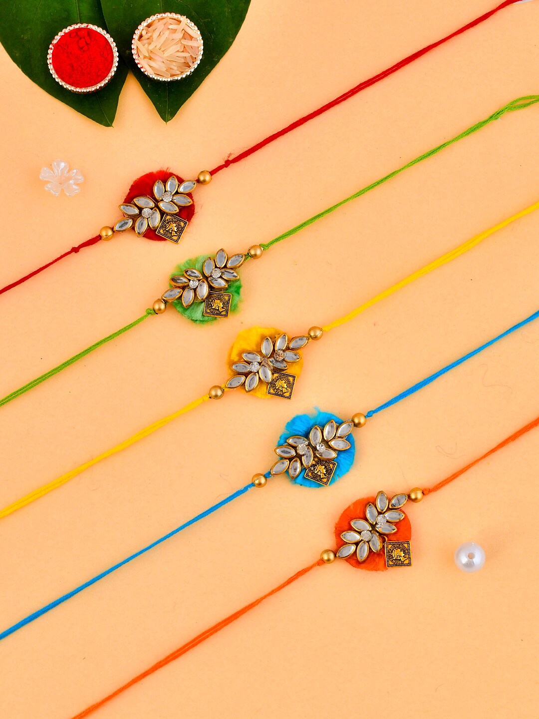 

Aapno Rajasthan Set Of 5 Kundan-Studded & Leaf Patterned Rakhis, Red