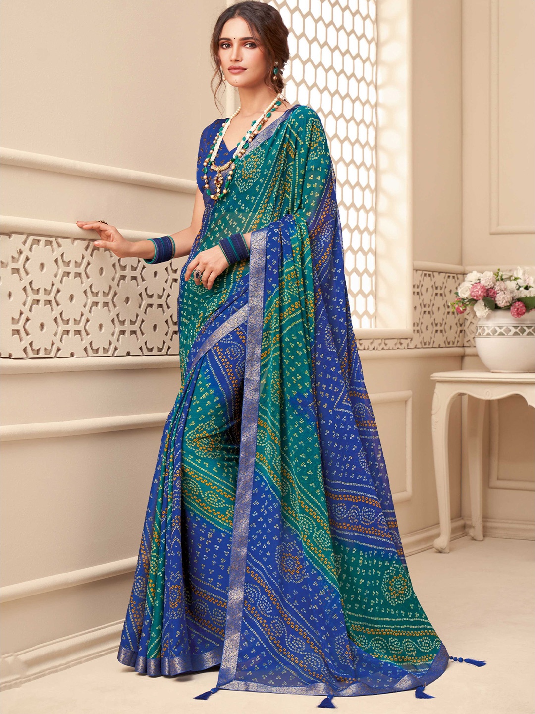 

Mitera Blue & Green Bandhani Printed Zari Saree