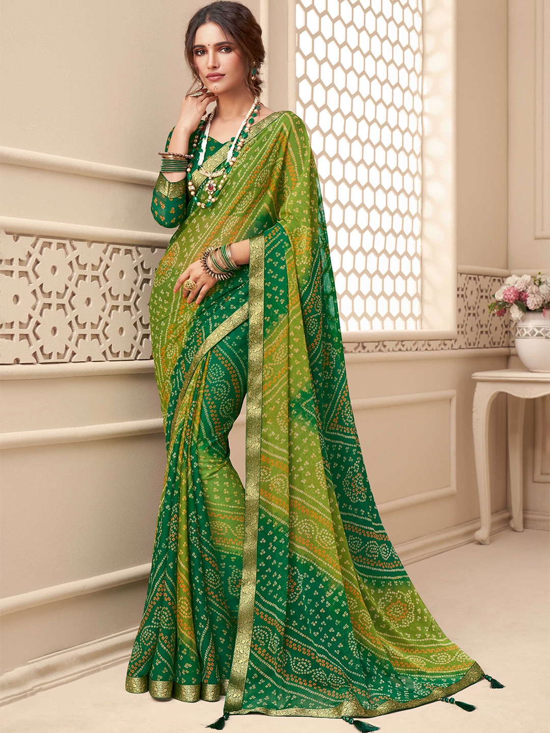 

Mitera Green & Orange Bandhani Printed Zari Bandhani Saree