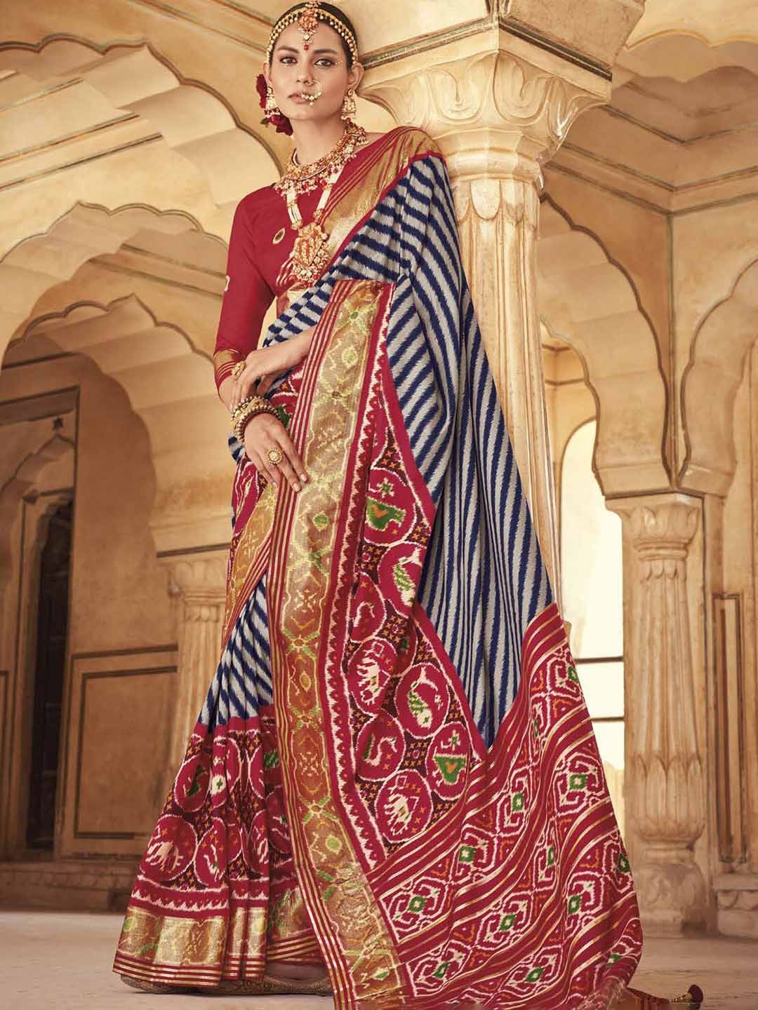

Mitera Blue & Red Leheriya Printed Zari Patola Saree