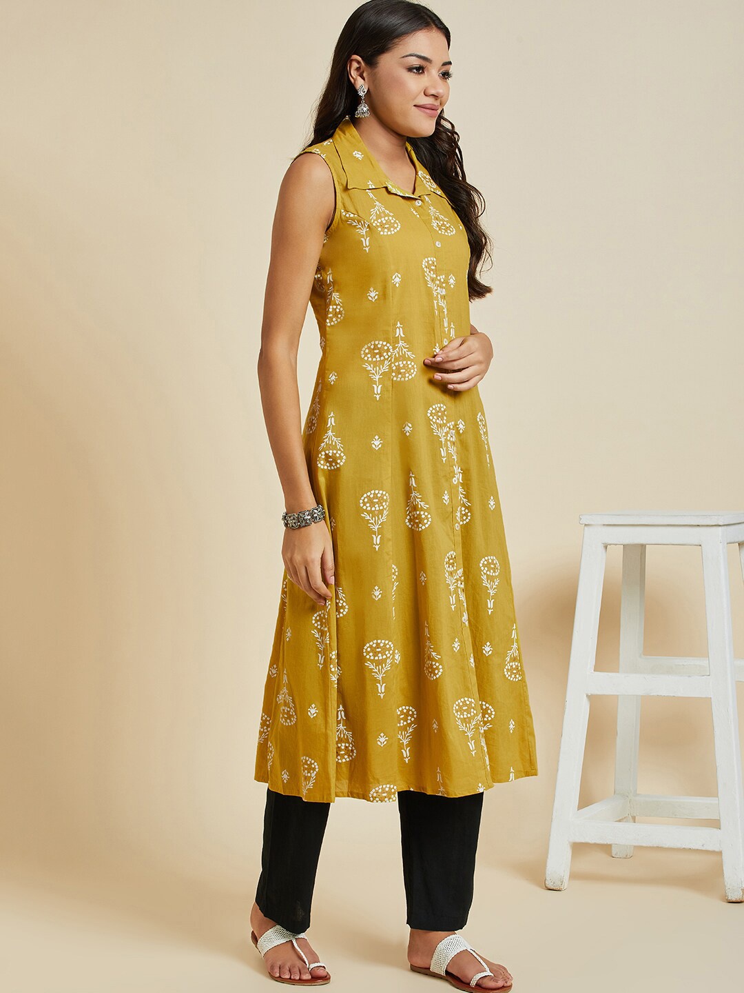 

Sangria Floral Printed Shirt Collar Cotton A-Line Kurta, Mustard