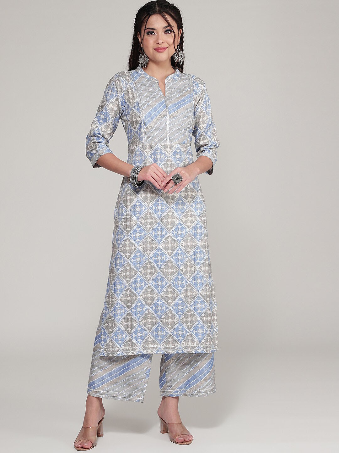 

CLEMIRA Geometric Printed Mandarin Collar Gotta Patti Kurta And Palazzos, Grey